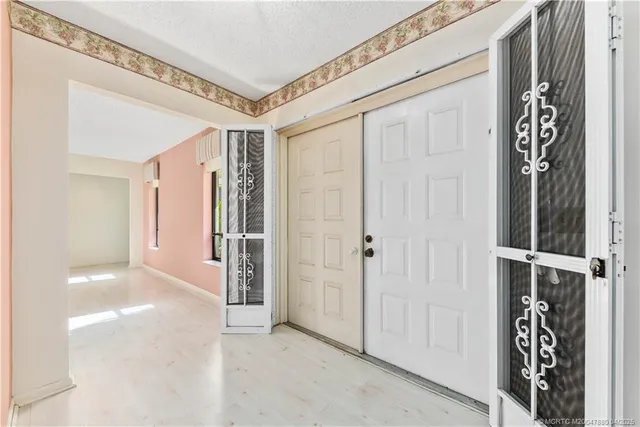 a view of a hallway with closet area