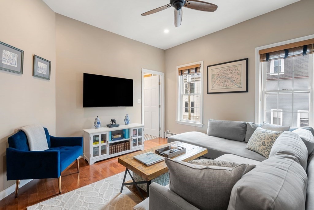 52 O Street, Unit 3 Boston, MA 02127 - Photo 11 of 15 a living room with furniture and a flat screen tv