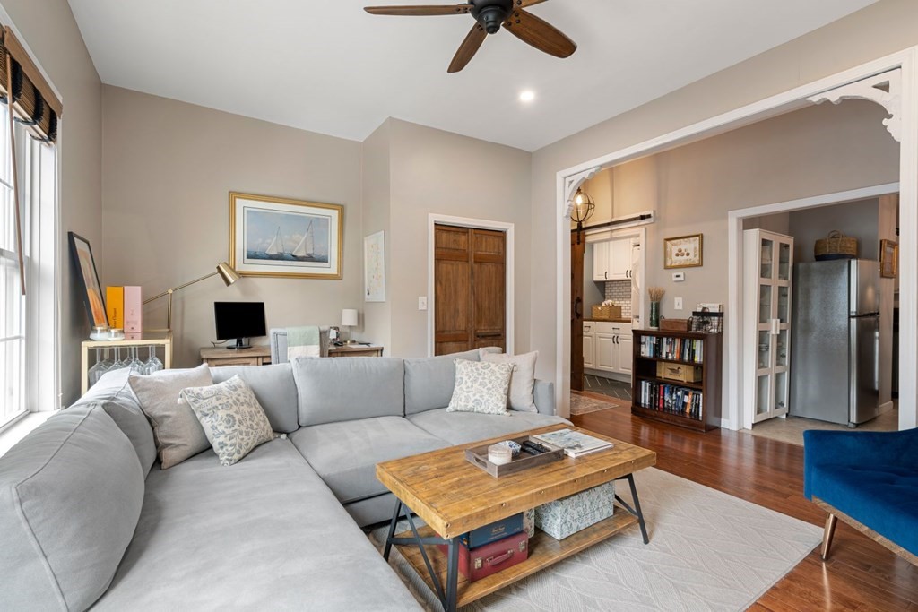 52 O Street, Unit 3 Boston, MA 02127 - Photo 2 of 15 a living room with furniture and a wooden floor