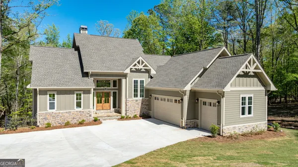 front view of a house with a yard