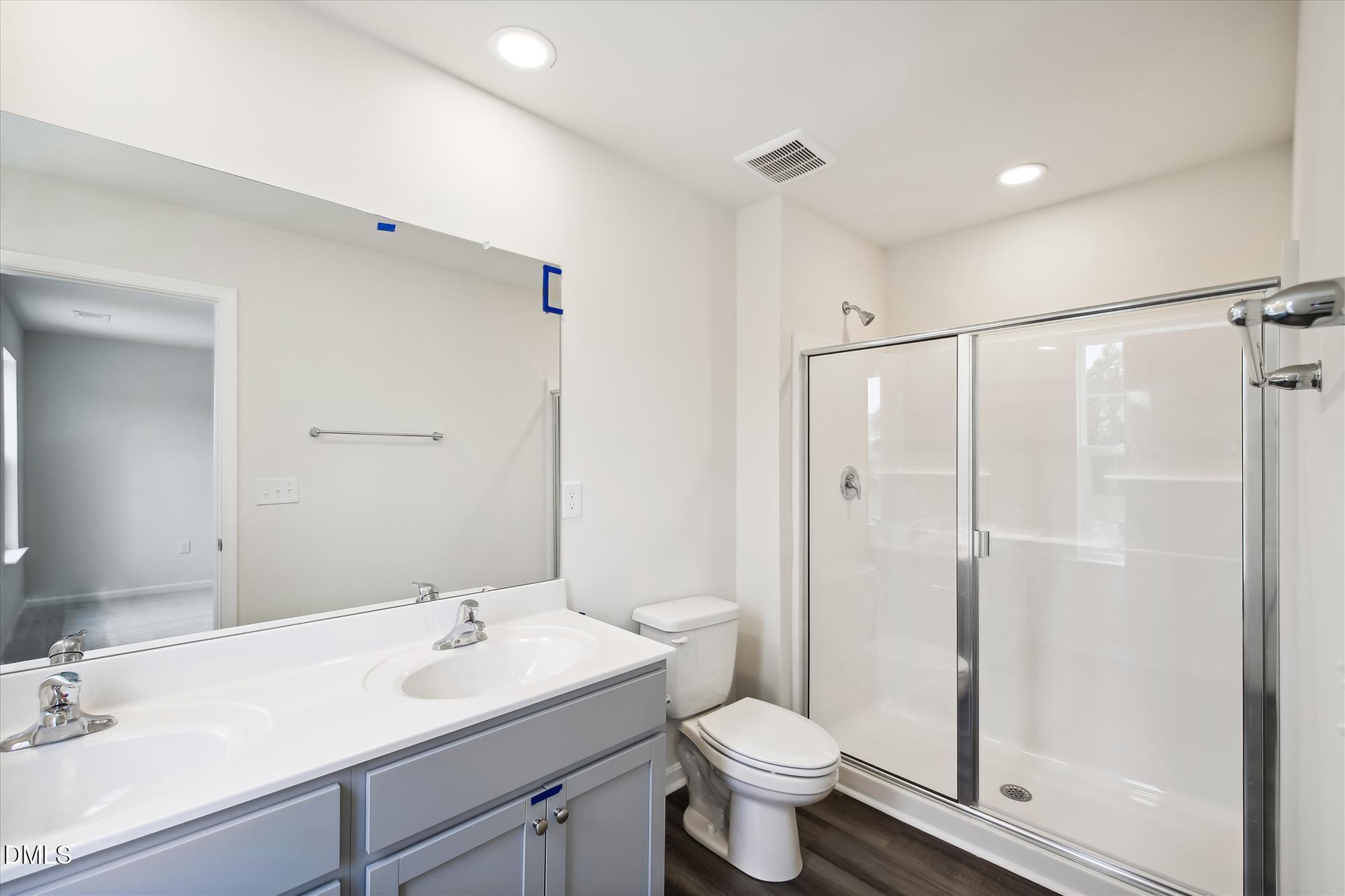 1409 Porchlight Court Raleigh, NC 27603 - Photo 17 of 19 Summit -upper level-primary bath