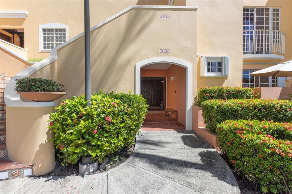 150 Candelero Road, Unit 762 Humacao, Humacao 00791 - Photo 1 of 1 a front view of a house with a yard