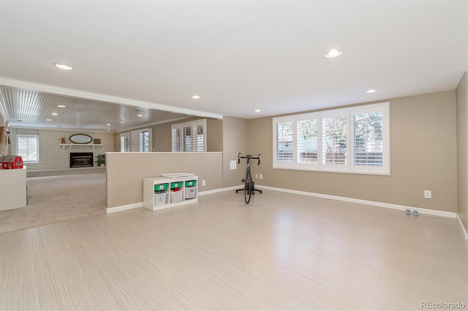 6145 South Eudora Way Centennial, CO 80121 - Photo 25 of 33 an empty room with furniture and a window