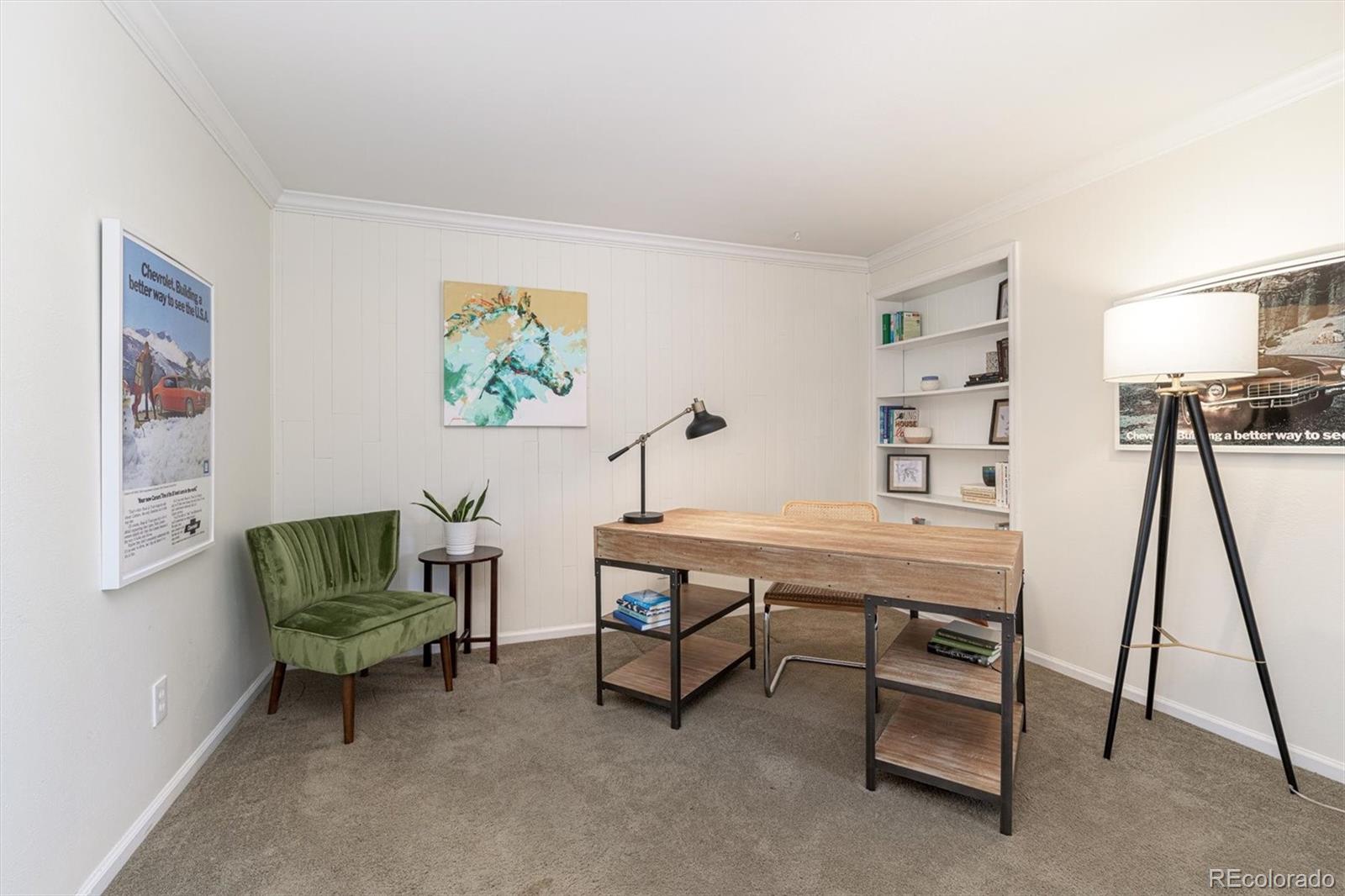 6145 South Eudora Way Centennial, CO 80121 - Photo 3 of 33 a living room with furniture a rug and a dining table