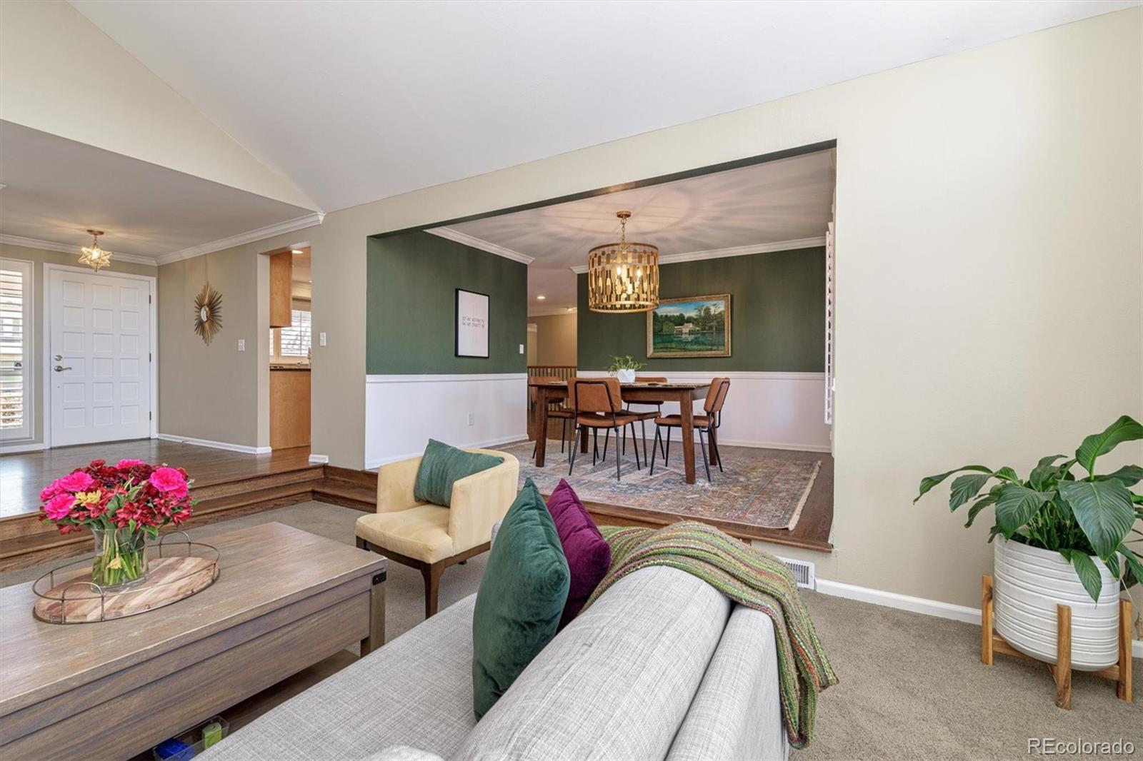 6145 South Eudora Way Centennial, CO 80121 - Photo 8 of 33 a living room with furniture and flowers