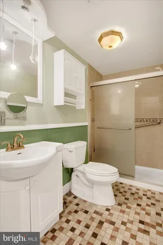 a big room with closet and a fireplace