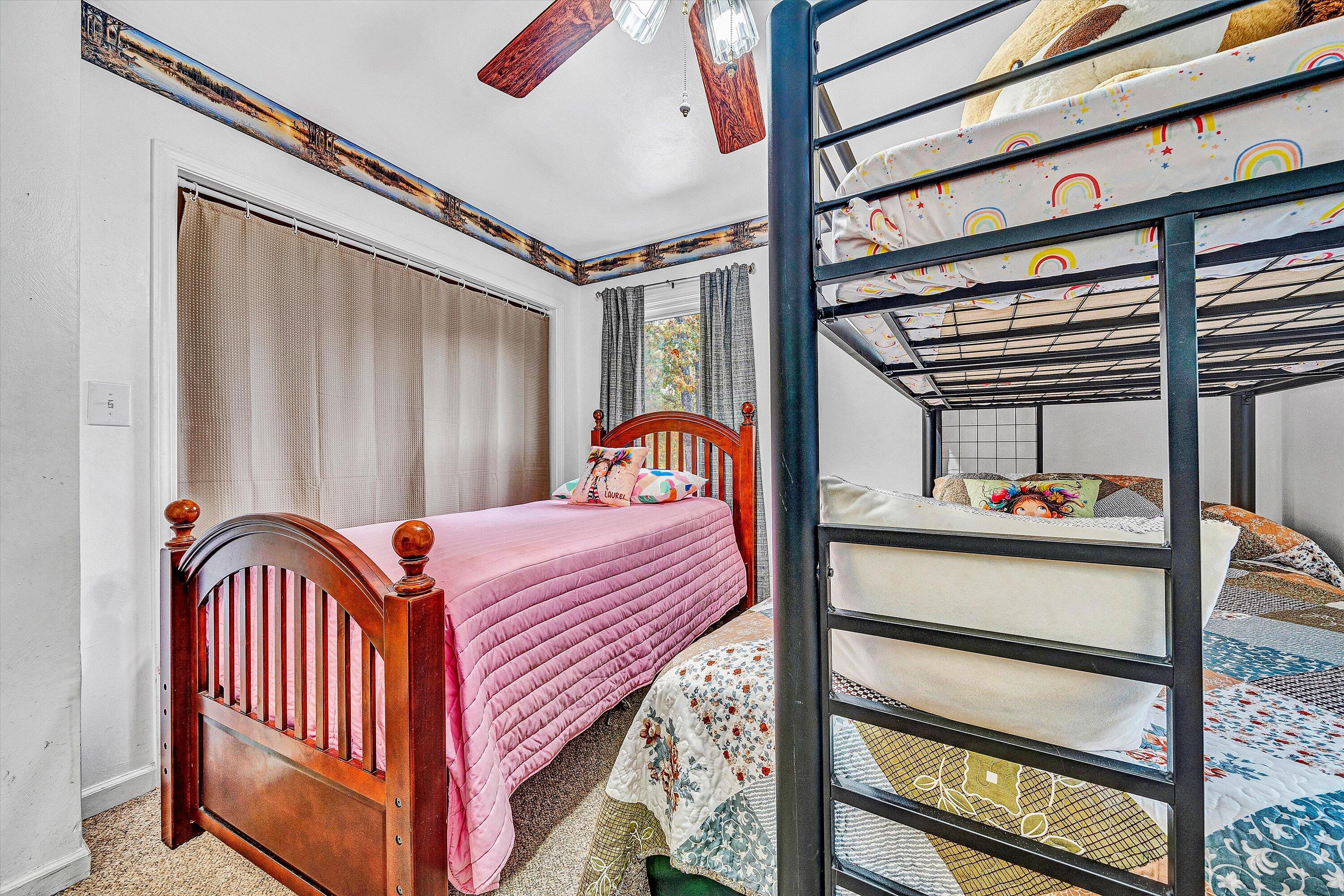 117 Country Lane Thaxton, VA 24174 - Photo 16 of 35 a bedroom with a bed and a window