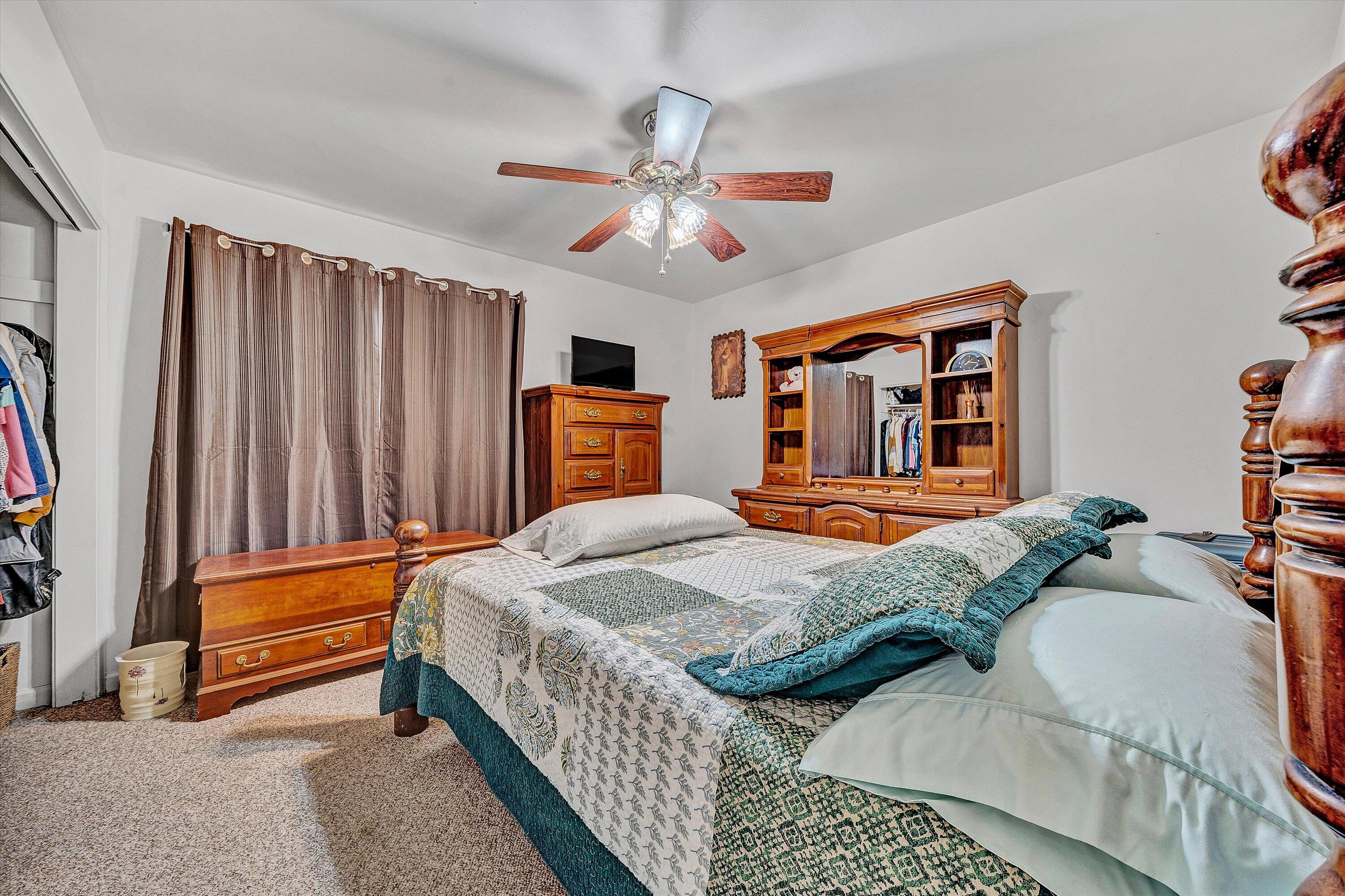 117 Country Lane Thaxton, VA 24174 - Photo 17 of 35 a bedroom with bed and dresser