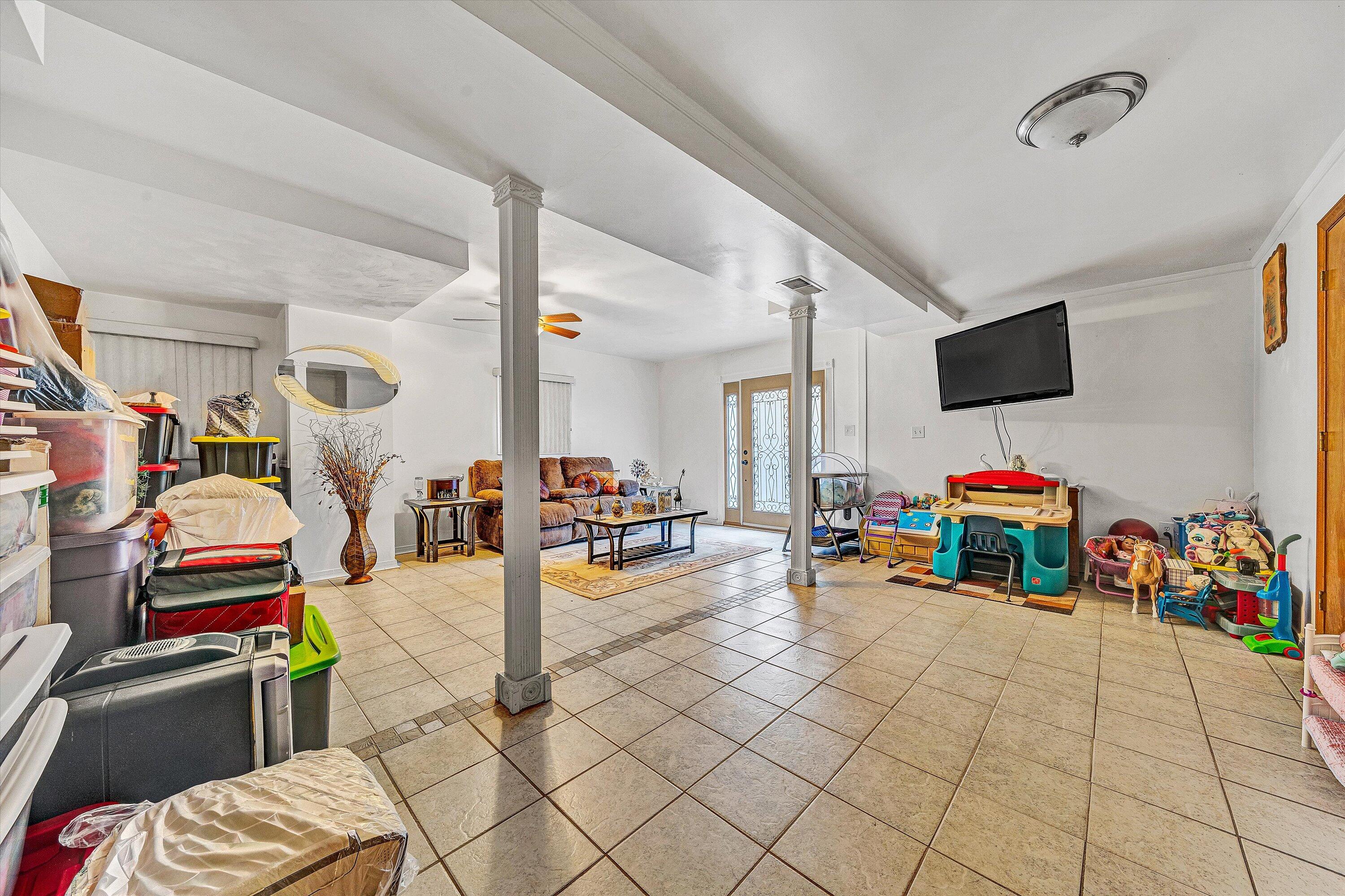 117 Country Lane Thaxton, VA 24174 - Photo 22 of 35 a children room with furniture and a flat screen tv