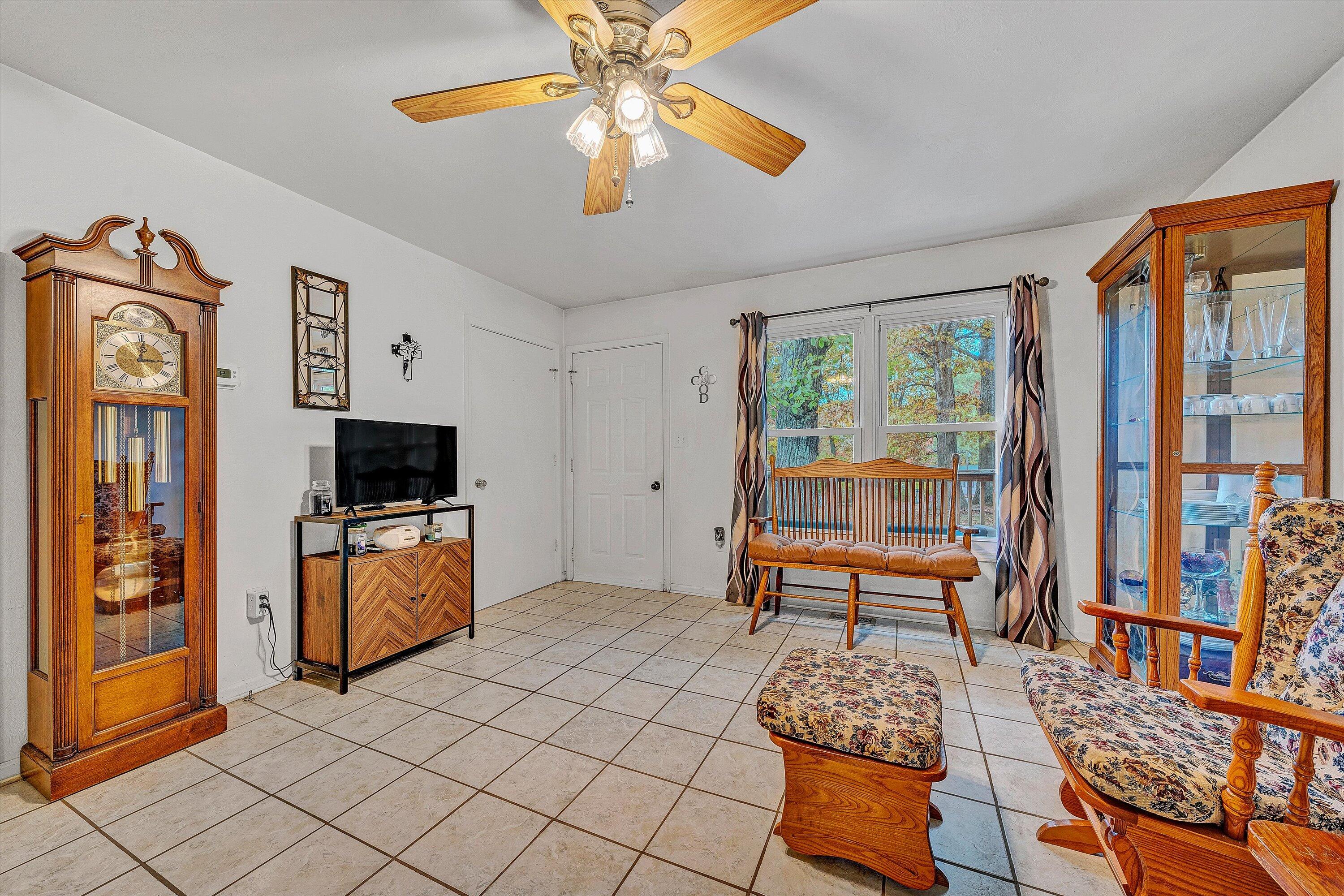 117 Country Lane Thaxton, VA 24174 - Photo 6 of 35 a bedroom with furniture and flat screen tv