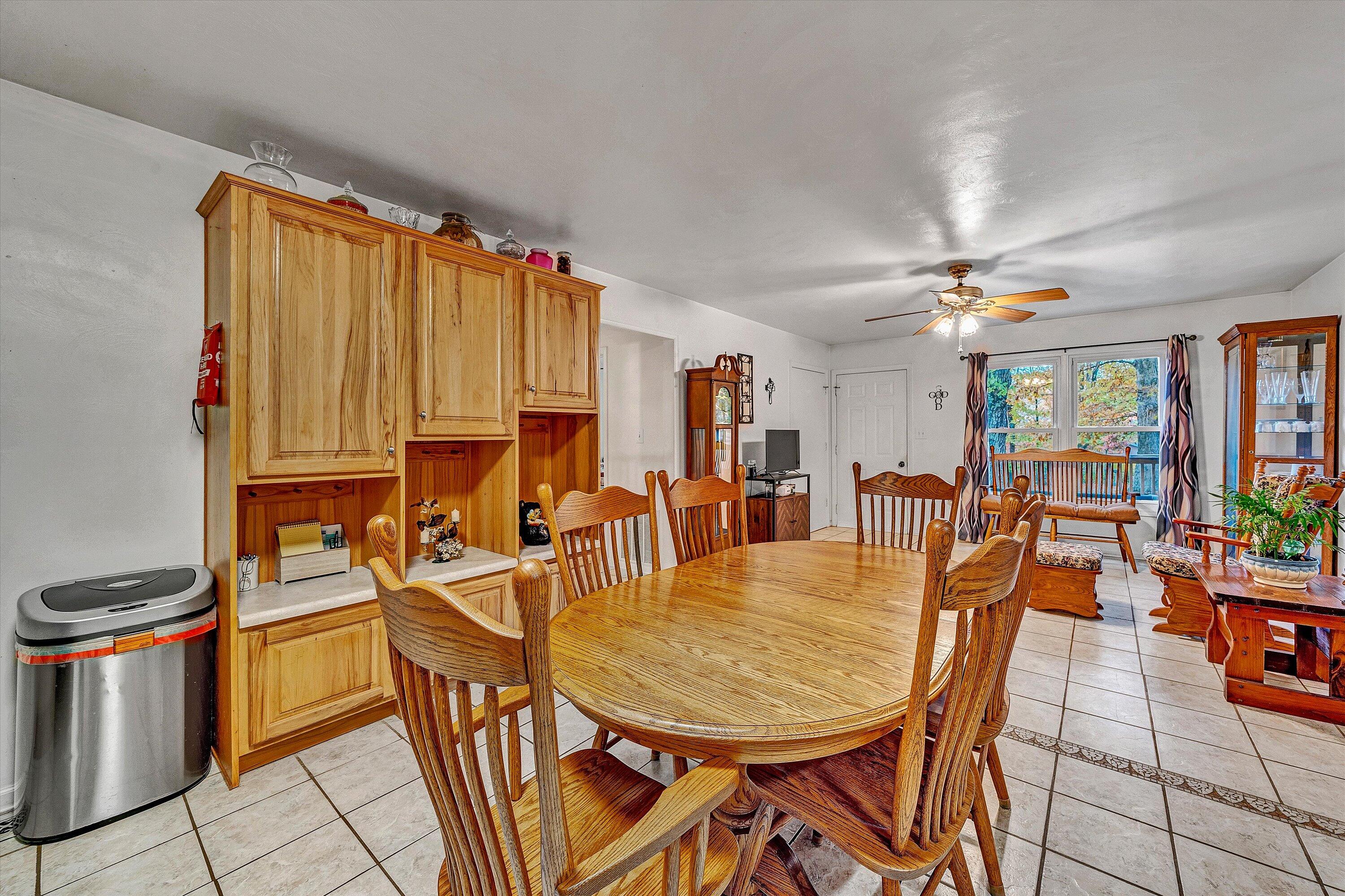117 Country Lane Thaxton, VA 24174 - Photo 9 of 35 a view of a dining room with furniture window and outside view