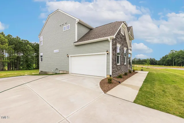 a view of a house with entertaining space