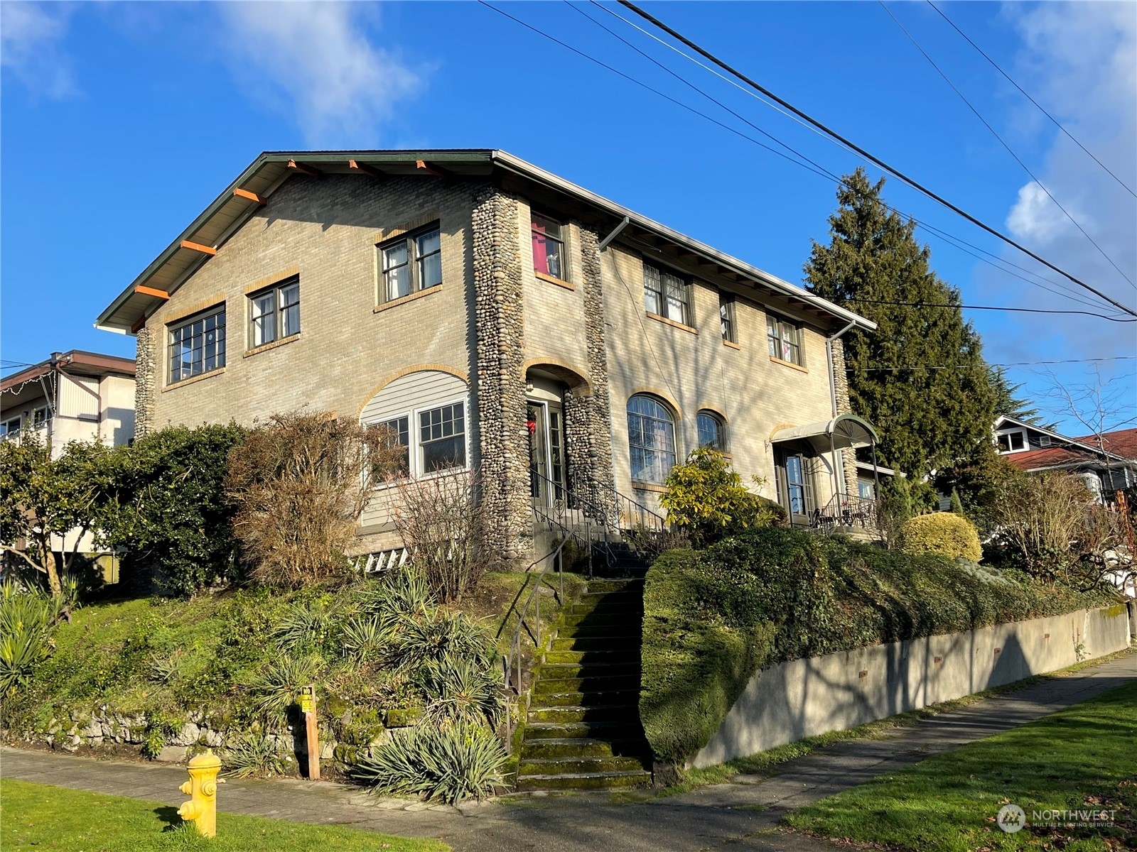 4202 Phinney Avenue North Seattle, WA 98103 - Photo 2 of 14 a front view of a house with garden