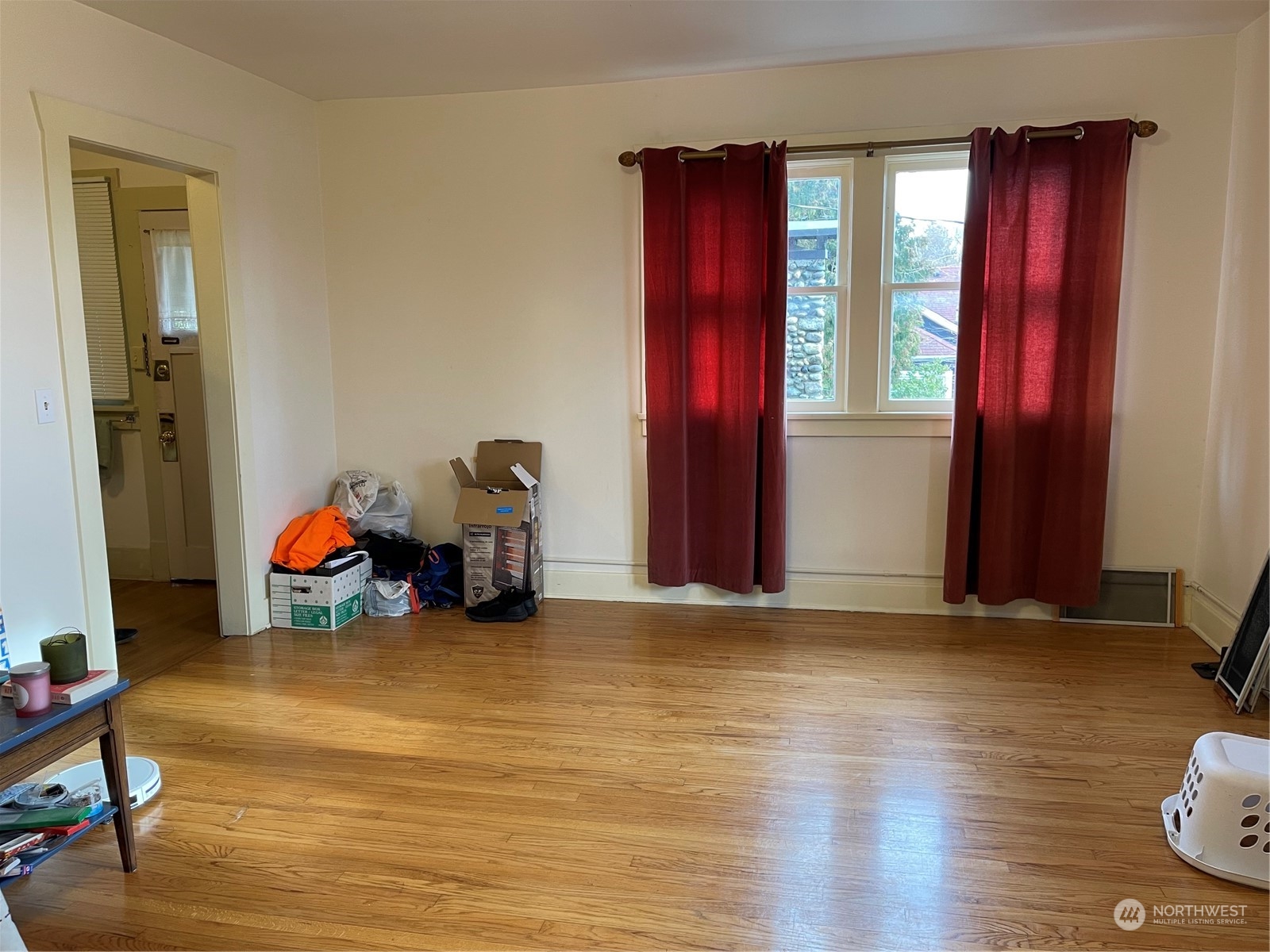 4202 Phinney Avenue North Seattle, WA 98103 - Photo 8 of 14 a view of a room with furniture gym equipment and windows