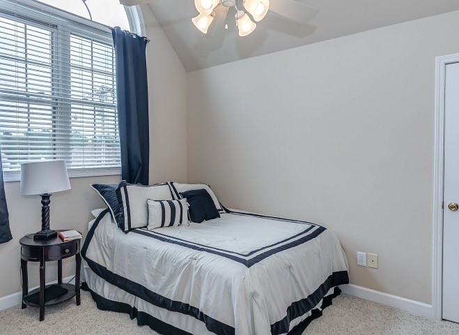 3003 Burts Crossing Springfield, TN 37172 - Photo 36 of 48 a bedroom with a bed and a window