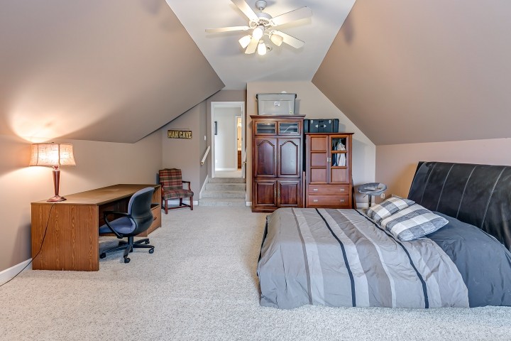 3003 Burts Crossing Springfield, TN 37172 - Photo 40 of 48 a bed room with a bed and a chandelier