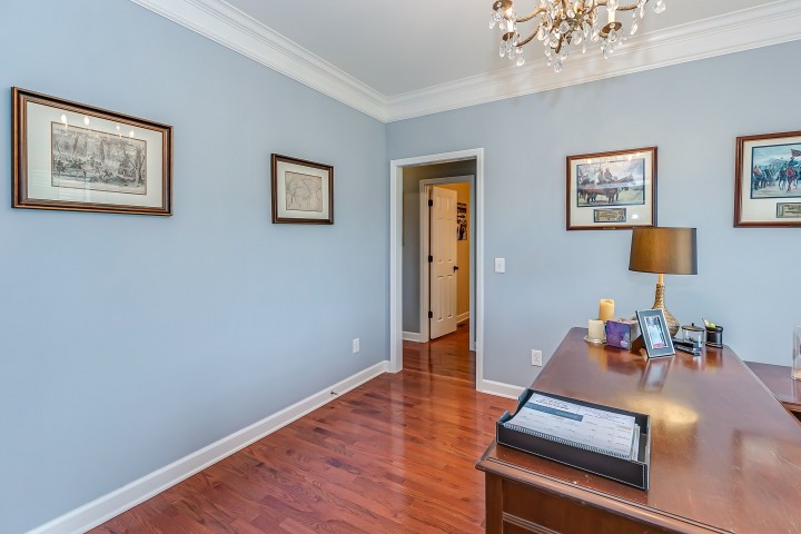 3003 Burts Crossing Springfield, TN 37172 - Photo 7 of 48 a room with wooden floor and a lamp on table
