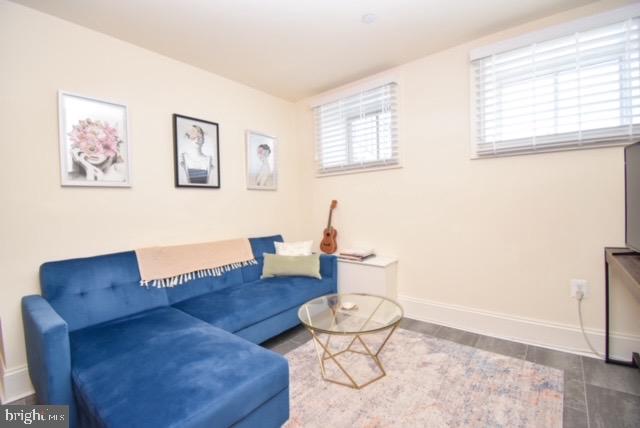 1625 St Paul Street, Unit B Baltimore, MD 21202 - Photo 1 of 21 Charming blue lounge in a bright space.