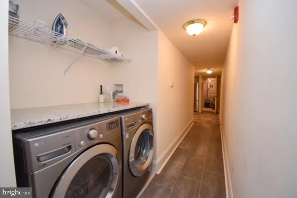 a utility room with dryer and washer