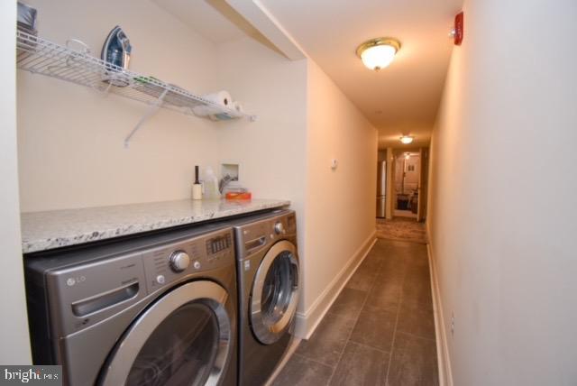 1625 St Paul Street, Unit B Baltimore, MD 21202 - Photo 14 of 21 Modern laundry space with sleek appliances.