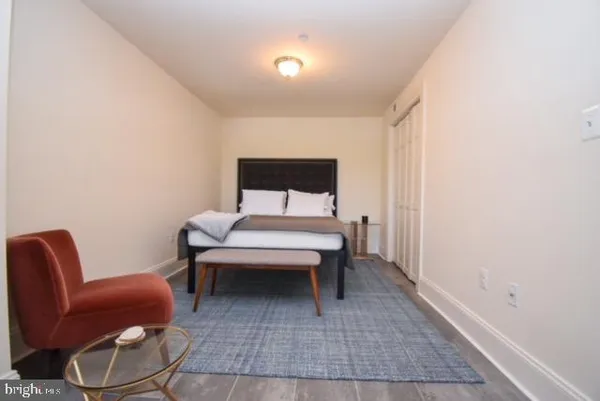 a room with furniture and a chair