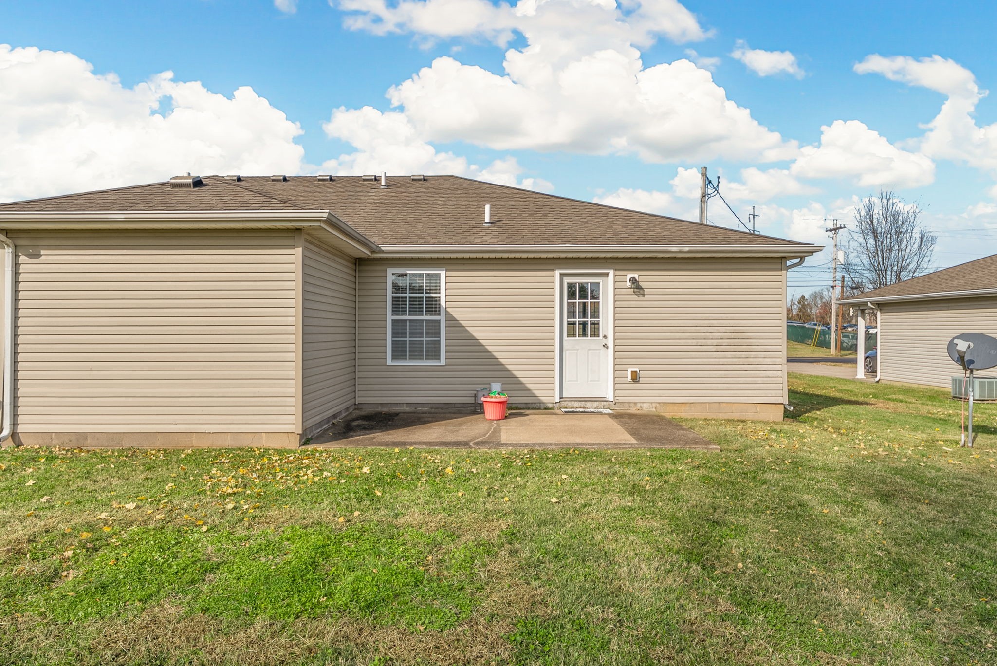 2278 Greenville Road Hopkinsville, KY 42240 - Photo 20 of 21 a backyard of a house with table and chairs