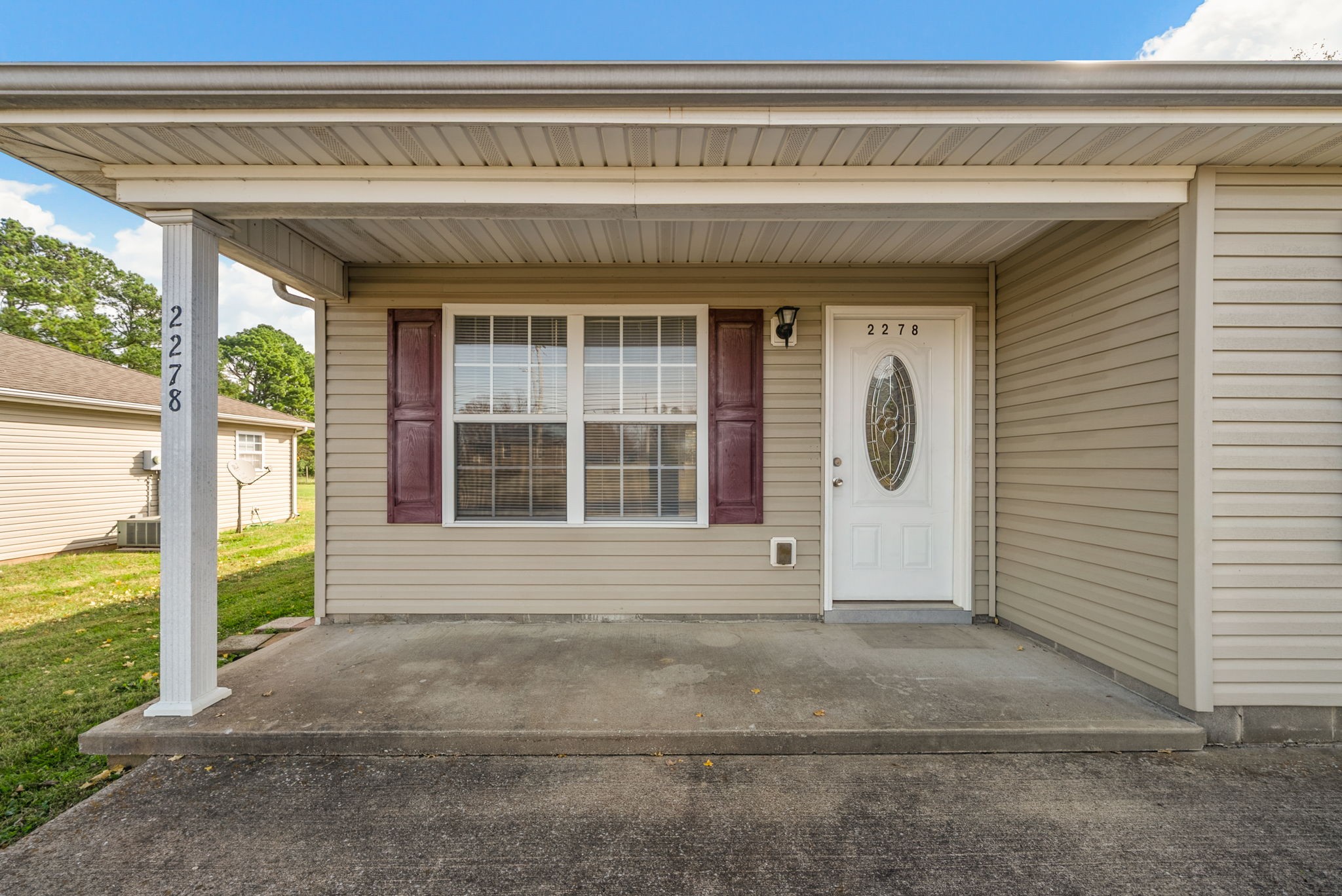 2278 Greenville Road Hopkinsville, KY 42240 - Photo 4 of 21 a front view of a house with a outdoor space
