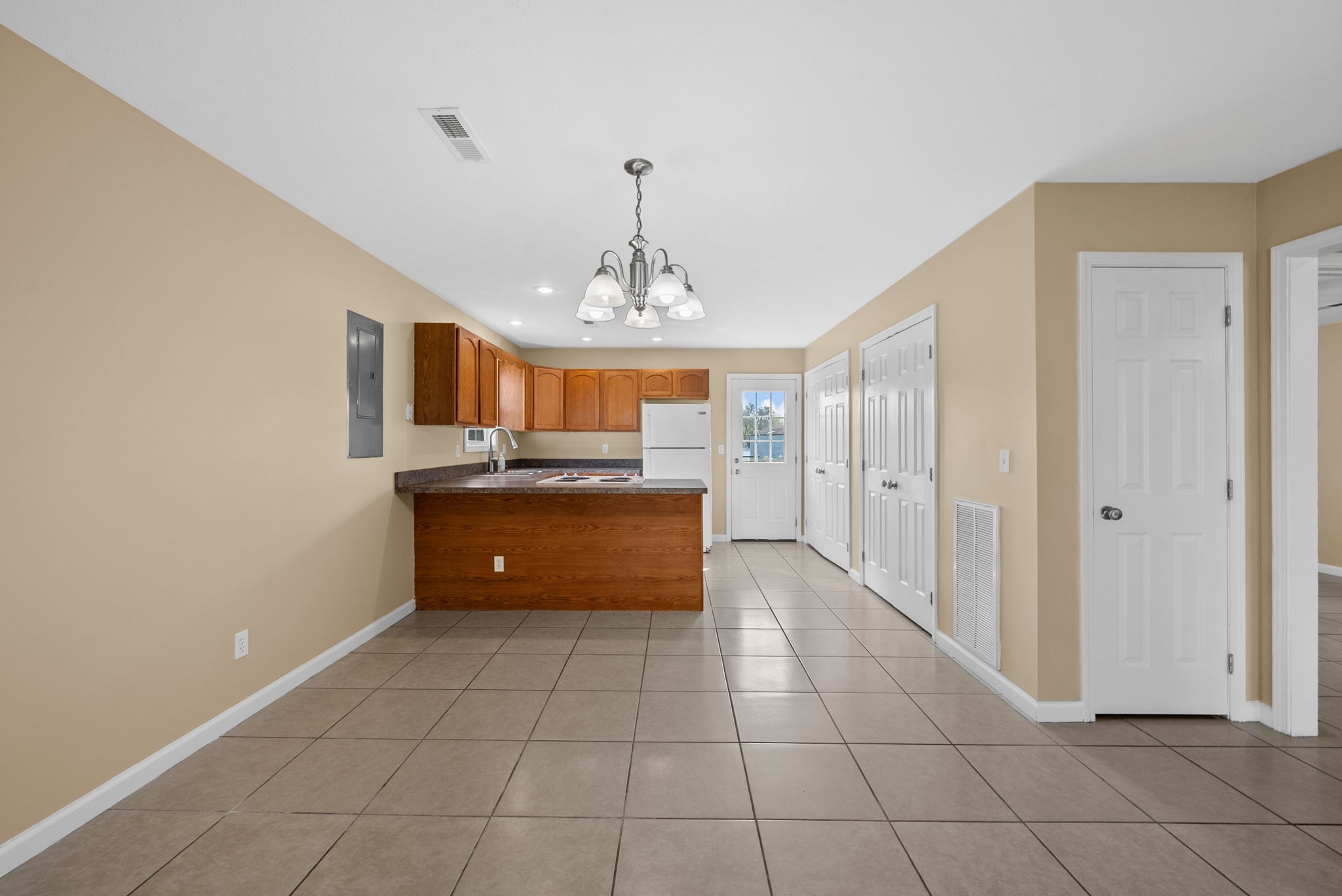 2278 Greenville Road Hopkinsville, KY 42240 - Photo 7 of 21 a large kitchen with a sink and cabinets