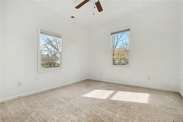 an empty room with windows