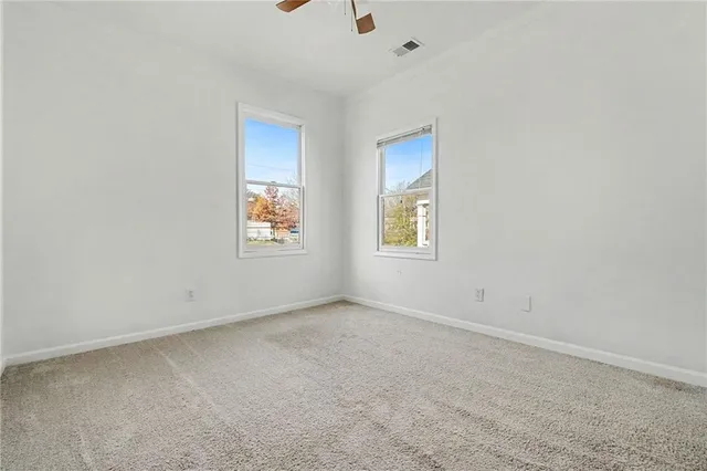 an empty room with windows