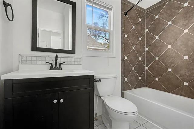 a bathroom with a sink and a toilet
