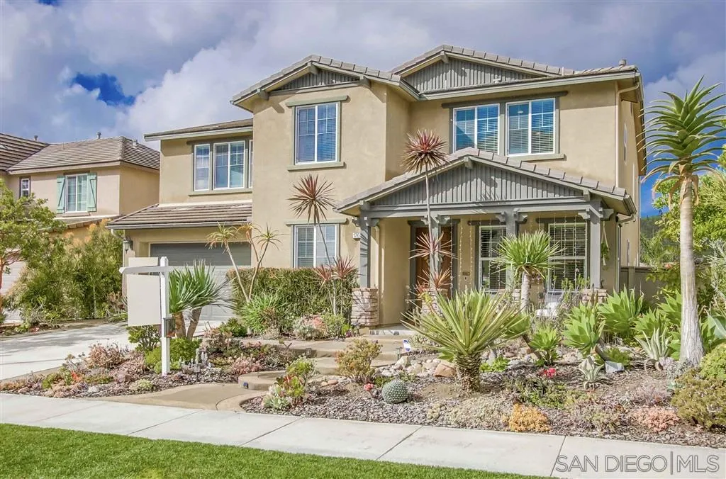 17628 Alva Road San Diego, CA 92127 - Photo 1 of 25 a front view of a house with garden