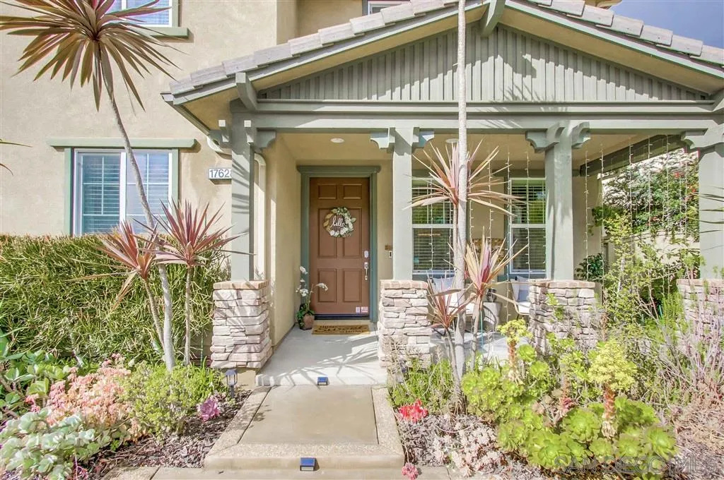 17628 Alva Road San Diego, CA 92127 - Photo 2 of 25 a view of a house with potted plants