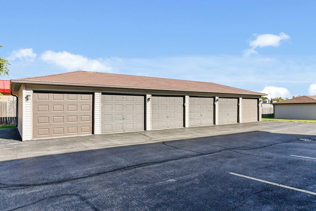 1233 Chalet Road, Unit 101 Naperville, IL 60563 - Photo 17 of 17 a view of an house with backyard space and balcony