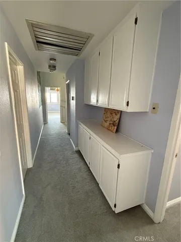 a en suite bathroom with a sink and a mirror