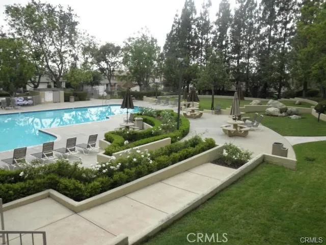 a view of a water pond with green space