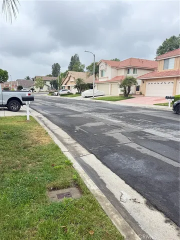 a view of a backyard with sitting area