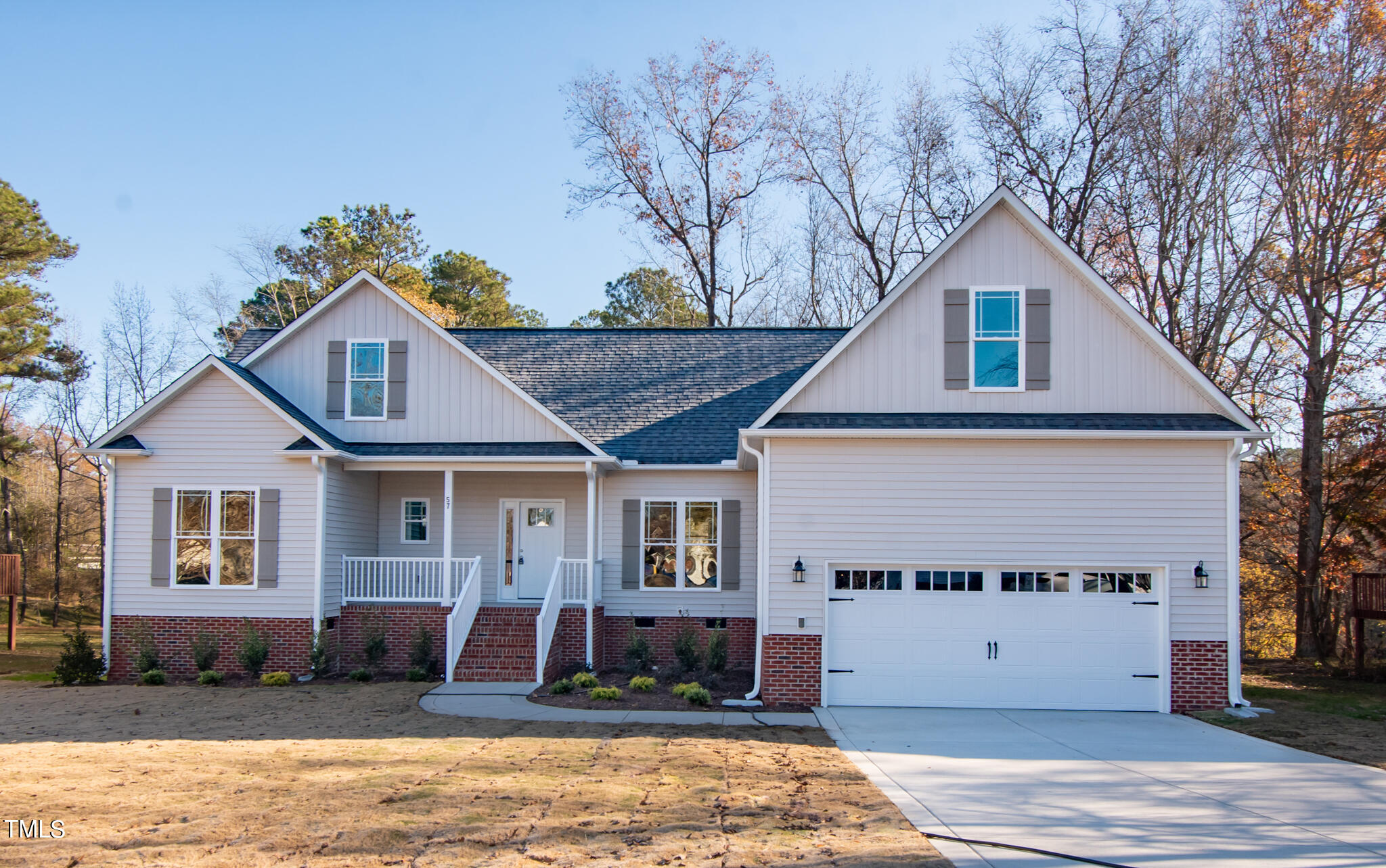 57 Waters Edge Drive Erwin, NC 28339 - Photo 1 of 59 a front view of a house with a yard