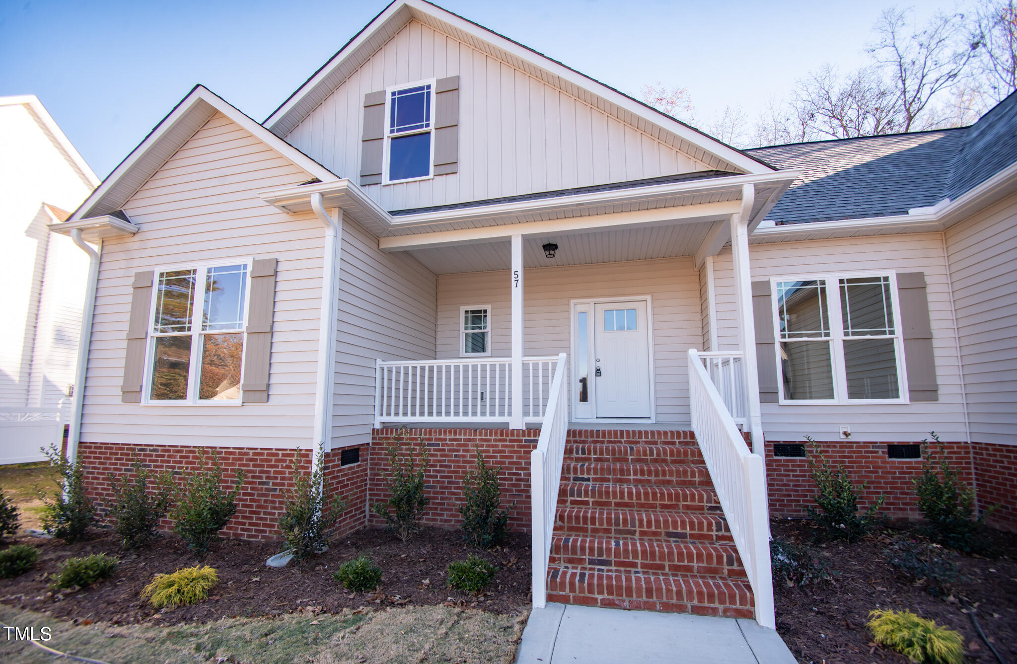 57 Waters Edge Drive Erwin, NC 28339 - Photo 13 of 59 a front view of a house with a yard