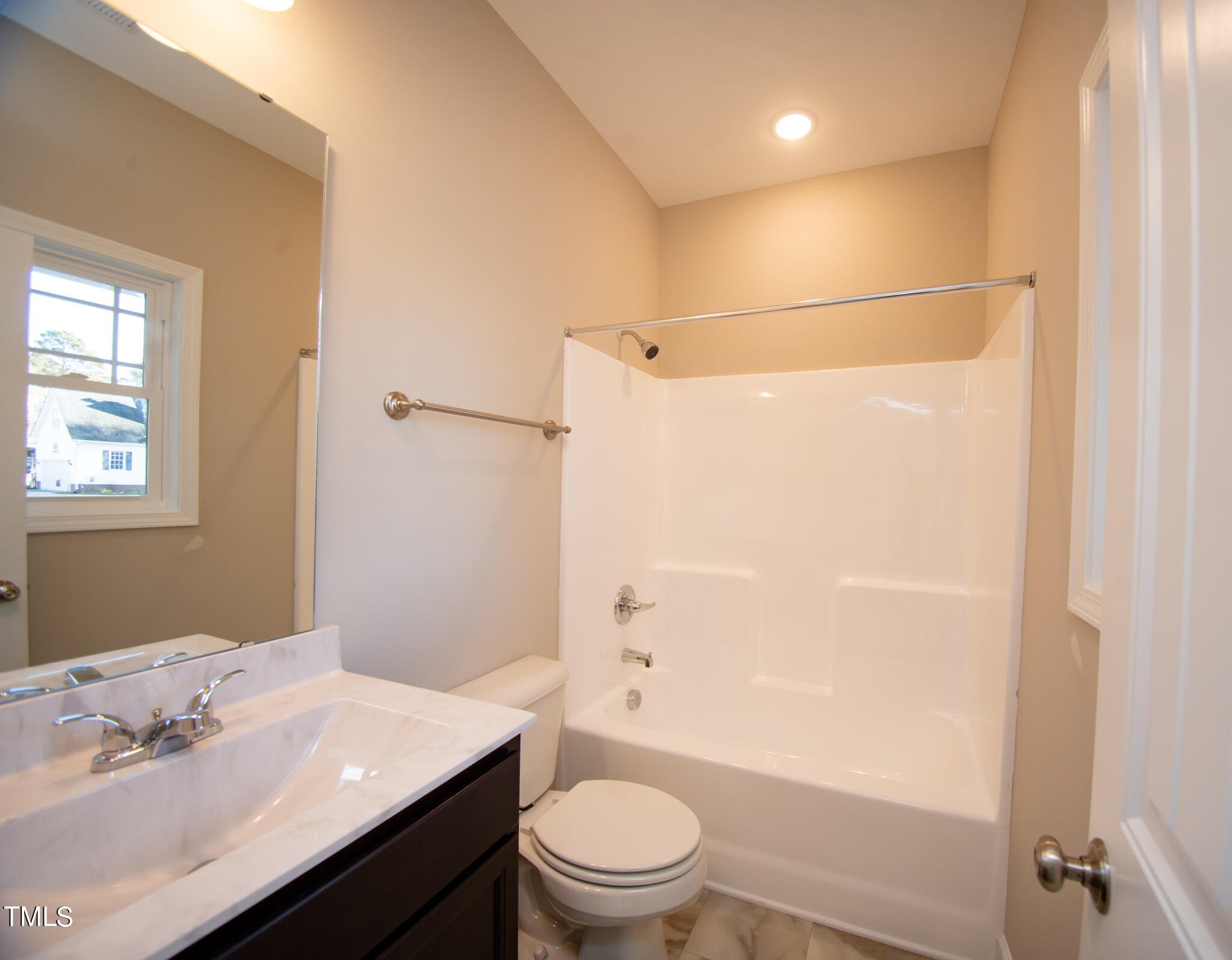 57 Waters Edge Drive Erwin, NC 28339 - Photo 19 of 59 a bathroom with a sink a toilet and shower