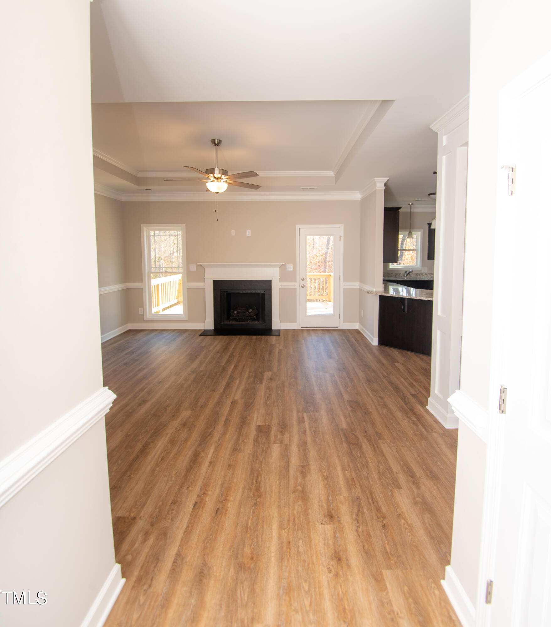 57 Waters Edge Drive Erwin, NC 28339 - Photo 26 of 59 a view of a kitchen with wooden floor and a window