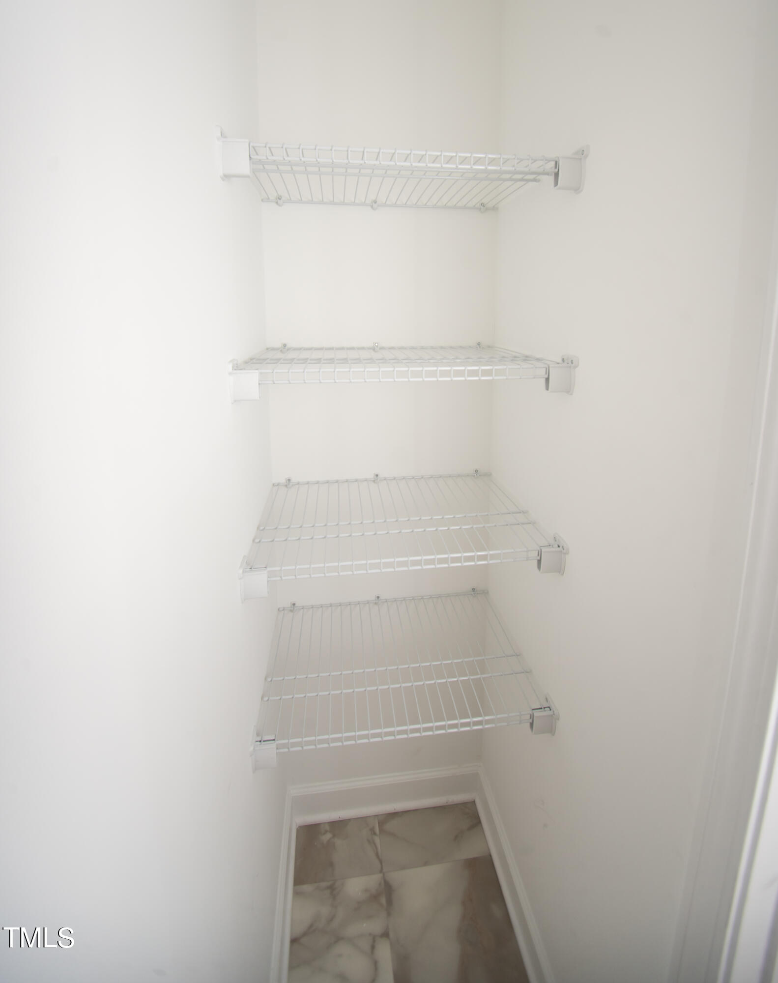57 Waters Edge Drive Erwin, NC 28339 - Photo 50 of 59 a view of walk in closet with empty racks