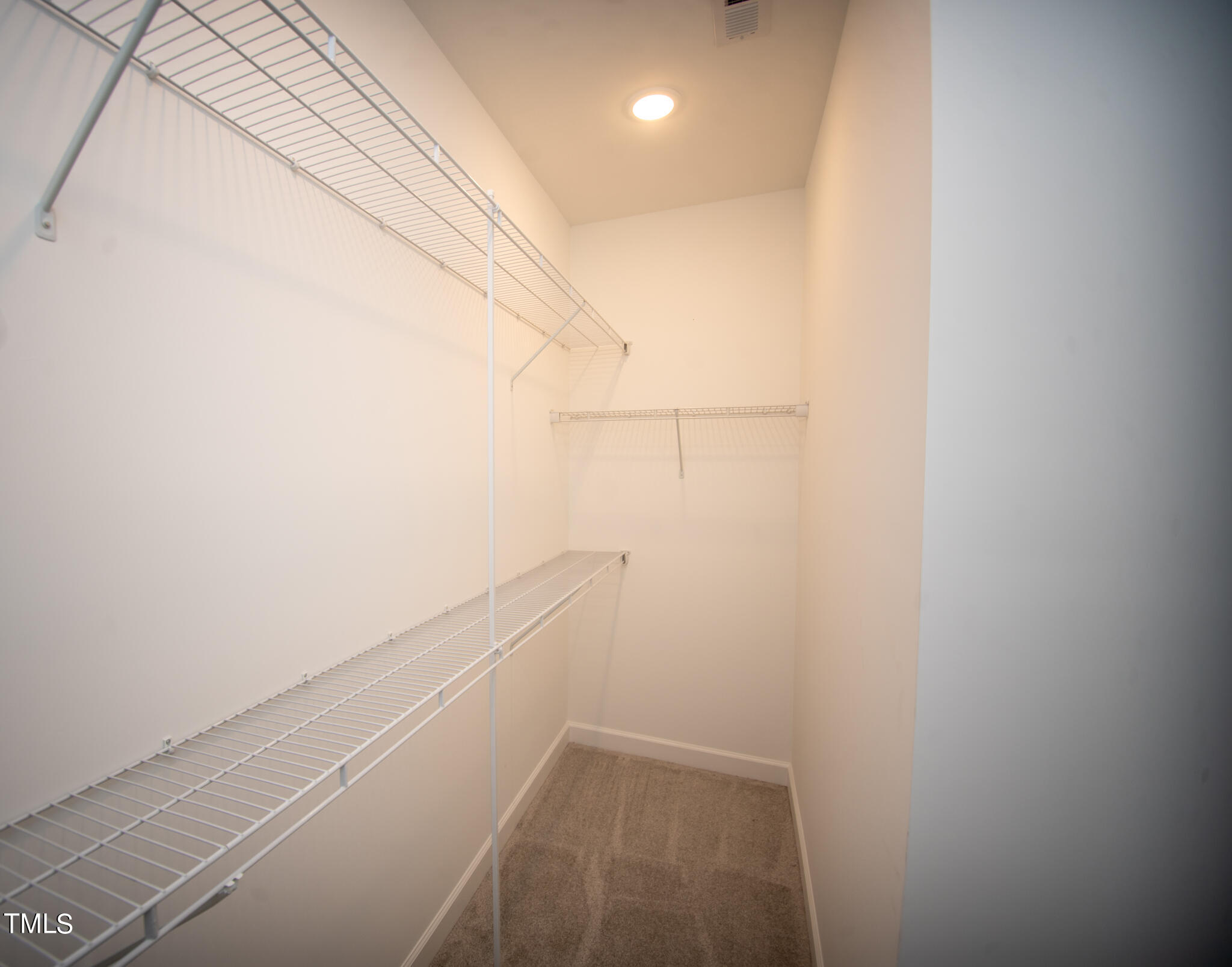 57 Waters Edge Drive Erwin, NC 28339 - Photo 53 of 59 a view of a room with racks on the wall