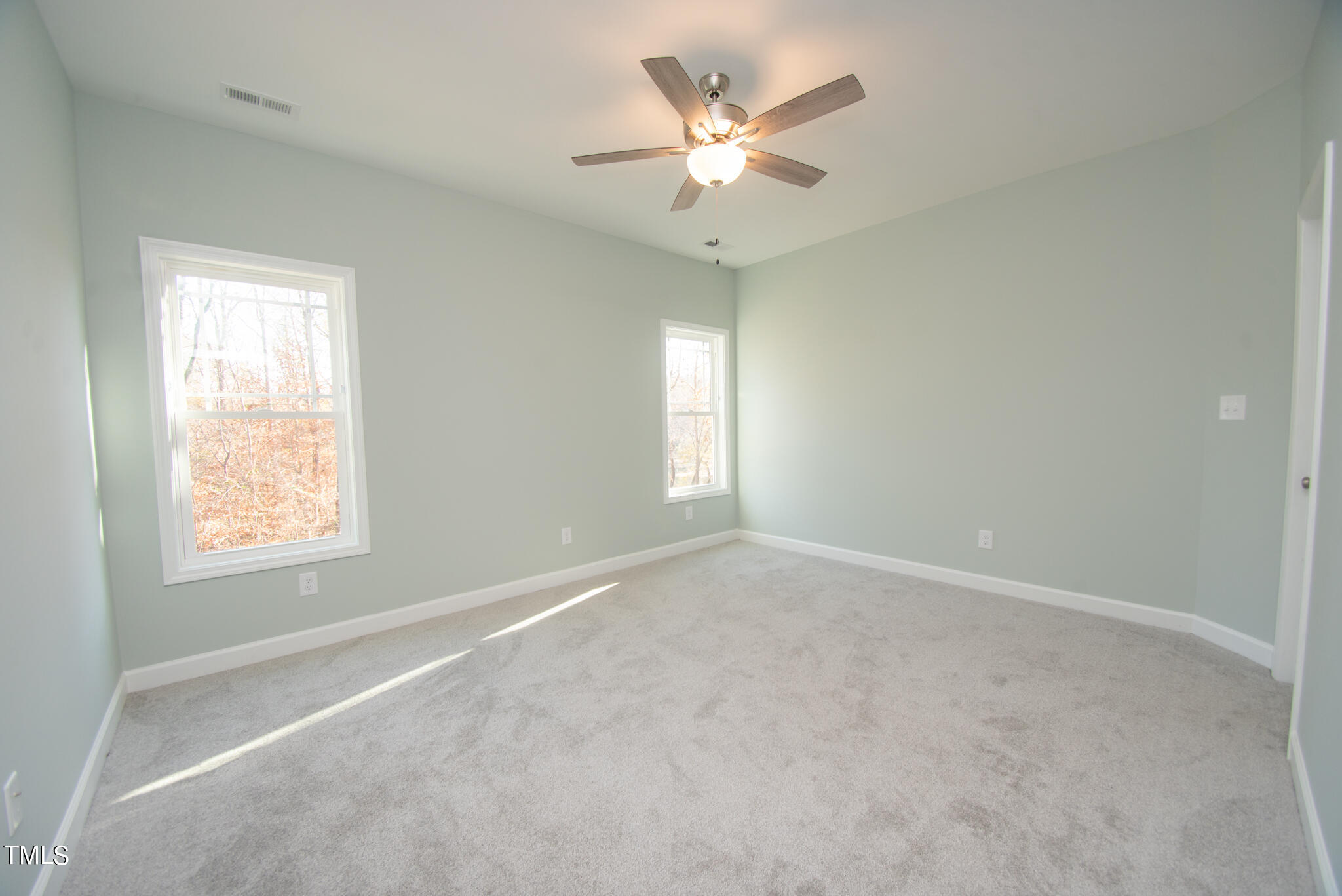 57 Waters Edge Drive Erwin, NC 28339 - Photo 55 of 59 an empty room with a window