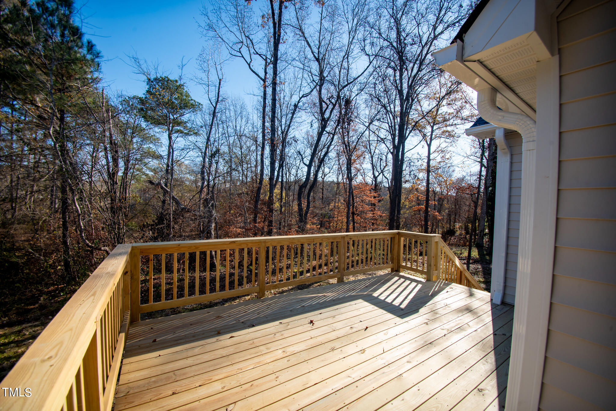 57 Waters Edge Drive Erwin, NC 28339 - Photo 7 of 59 a view of balcony with wooden floor and fence