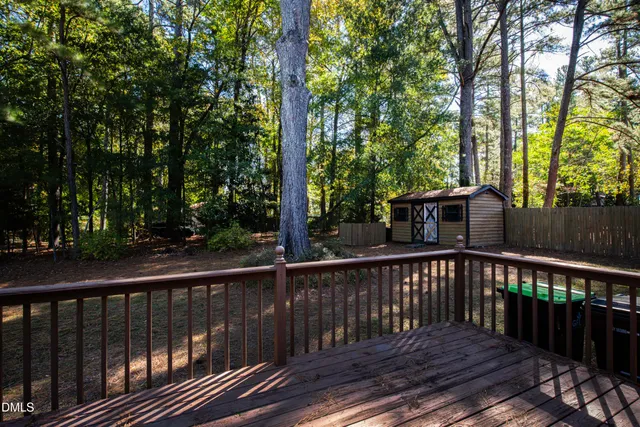 a view of a wooden roof deck