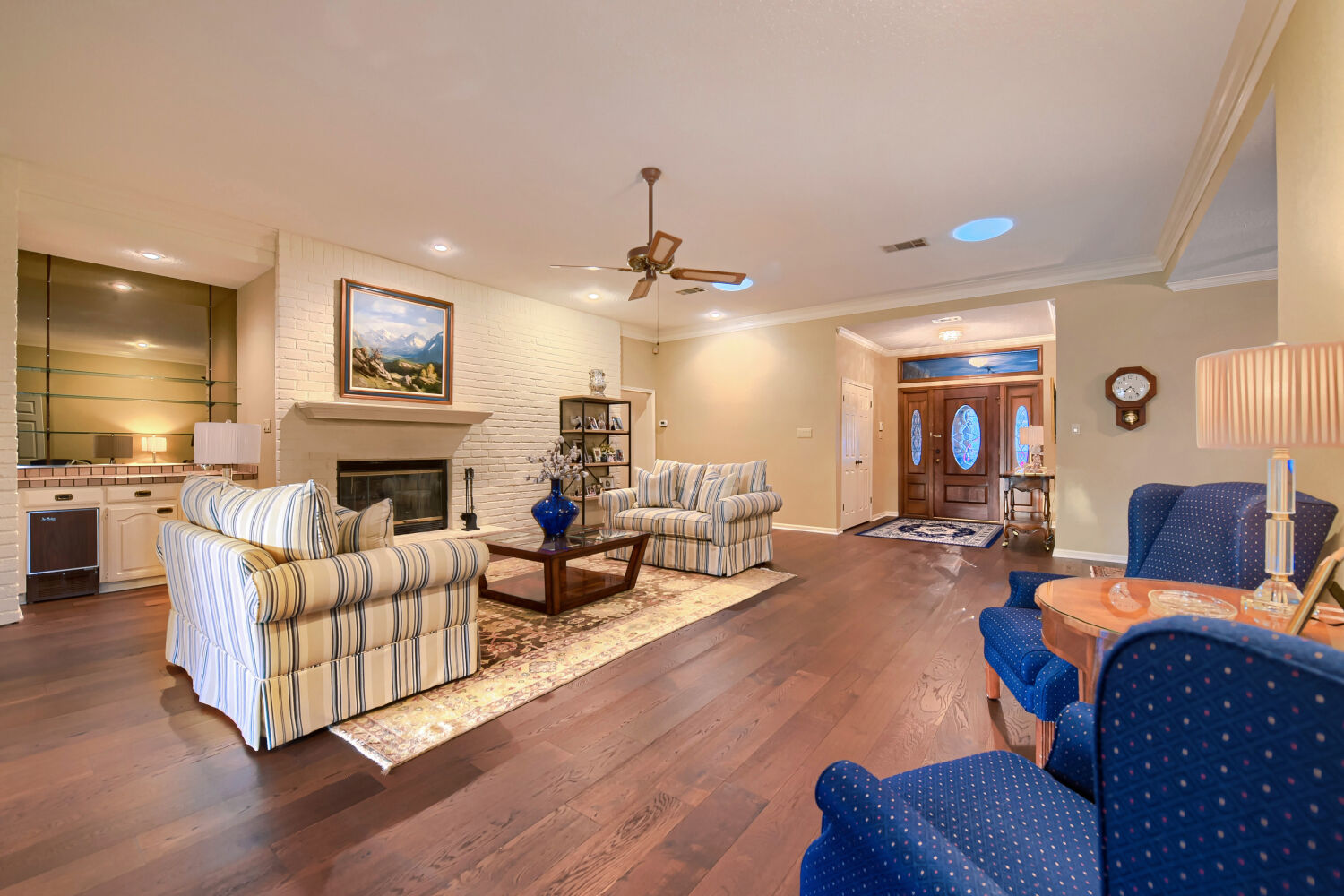 10904 Legends Lane Austin, TX 78747 - Photo 19 of 36 a living room with furniture fireplace and a large window