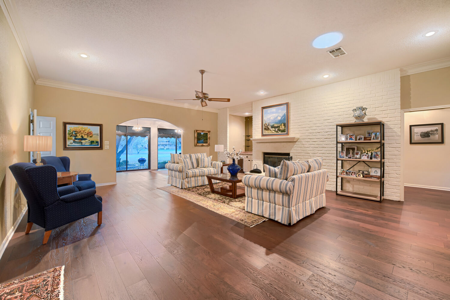 10904 Legends Lane Austin, TX 78747 - Photo 22 of 36 a living room with furniture and a wooden floor