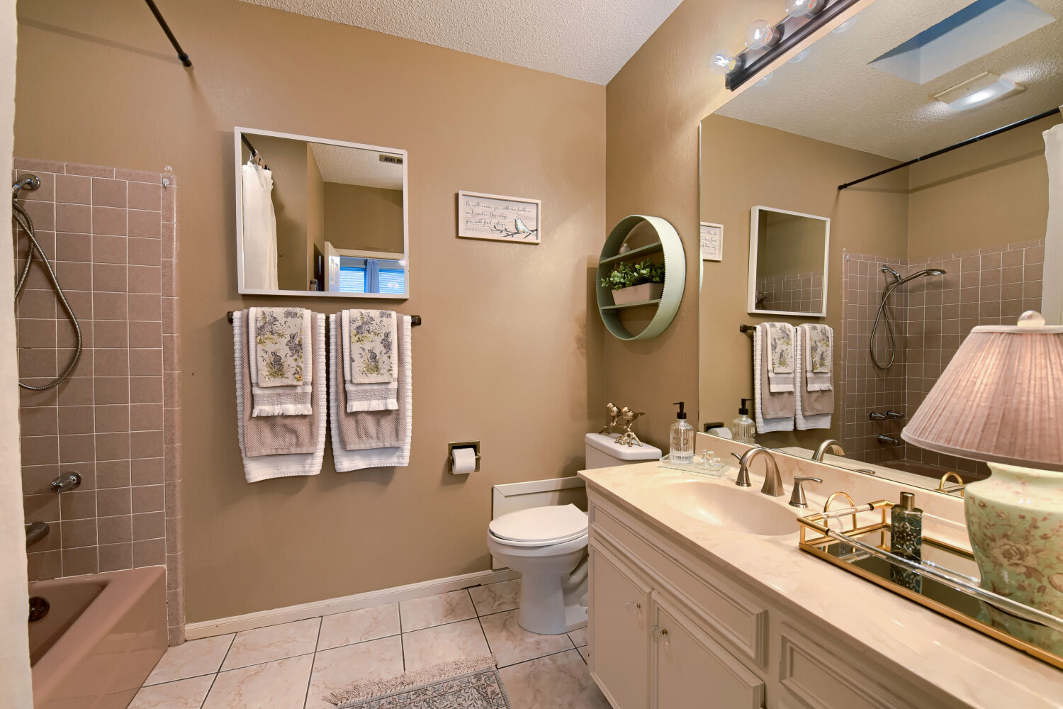 10904 Legends Lane Austin, TX 78747 - Photo 28 of 36 a bathroom with a granite countertop sink mirror vanity and toilet