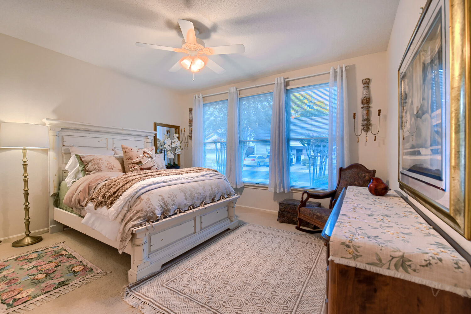 10904 Legends Lane Austin, TX 78747 - Photo 29 of 36 a bedroom with a bed and wooden floor